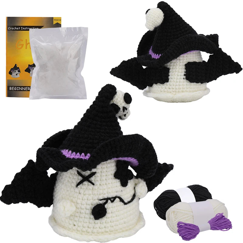 Crocheted skeleton with witch hat and black wings, including yarn and instructions on a white background