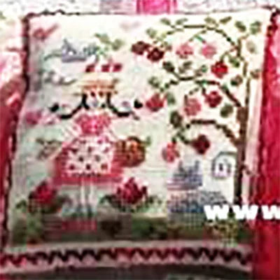 Decorative pillow with a floral pattern on a red background
