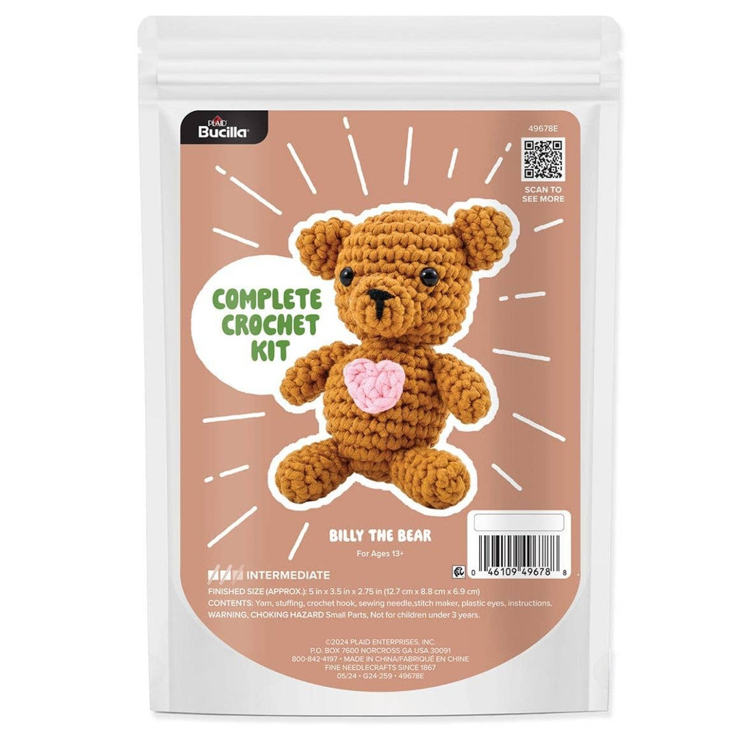 Crochet kit packaging for a teddy bear with a heart, featuring Bucilla branding.