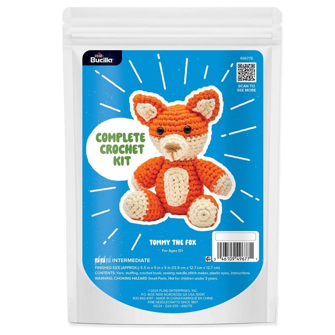 Bucilla crochet kit packaging for Tommy the Fox on a white background