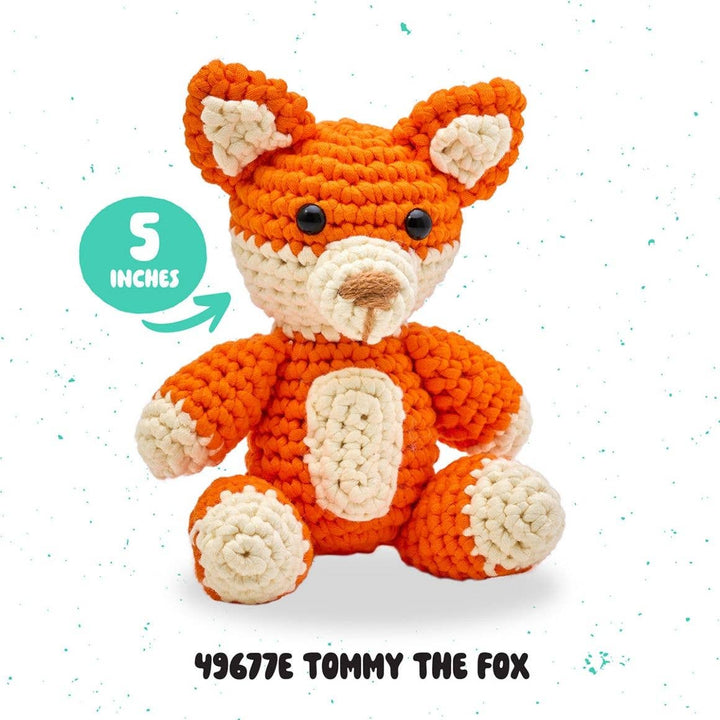 Crocheted fox toy with size indicator and product code on a white background