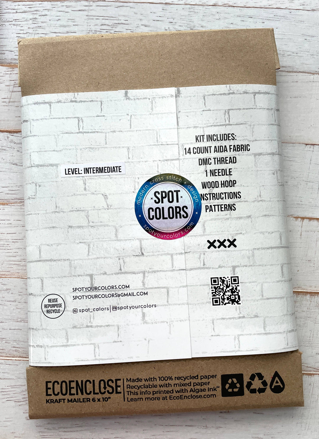 Packaging of Spot Your Colors craft kit with white brick pattern on cardboard