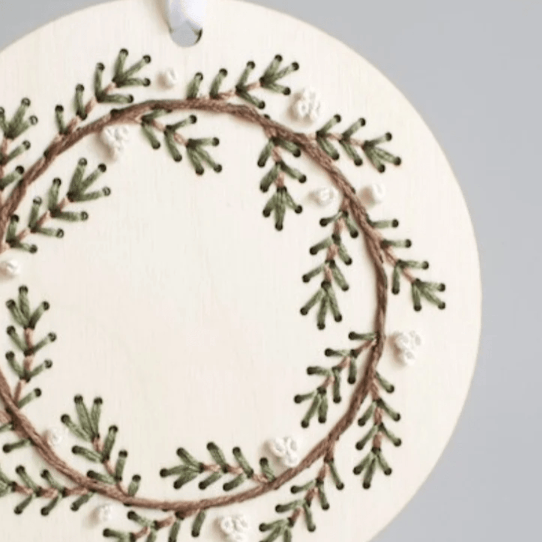 The HNB House - Pine Wreath Ornament - DIY Wood Embroidery Kit: Cellophane Bag - Pisgah Needleworks